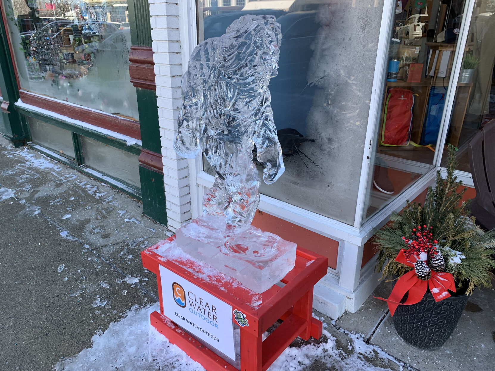Clear Water Outdoor featured an ice sculpture of a hiker outside of its business